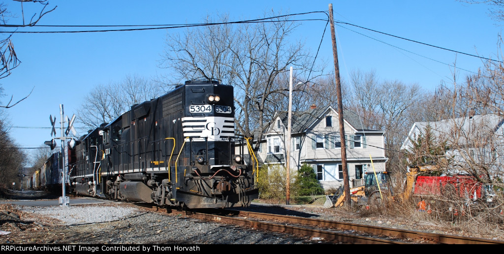 9:59 finds RP1 passing through the Broad Street grade crossing.
